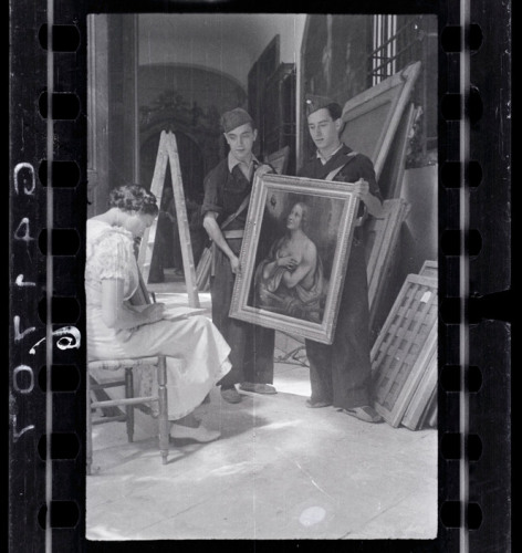 SPAIN. Madrid. October/November, 1936. Woman making an inventory of the paintings in the collection of Las Descalzas Reales with two Republican soldiers. (Negative from the "Mexican Suitcase.")Contact email:
New York : photography@magnumphotos.com
Paris : magnum@magnumphotos.fr
London : magnum@magnumphotos.co.uk
Tokyo : tokyo@magnumphotos.co.jpContact phones:
New York : +1 212 929 6000
Paris: + 33 1 53 42 50 00
London: + 44 20 7490 1771
Tokyo: + 81 3 3219 0771Image URL:
http://www.magnumphotos.com/Archive/C.aspx?VP3=ViewBox_VPage&IID=2K7O3RTQQEEW&CT=Image&IT=ZoomImage01_VForm