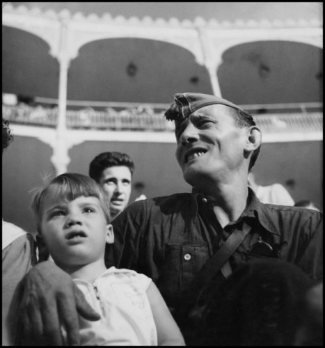 Republican militiaman and child at bullfight and military show, Barcelona, August 1936