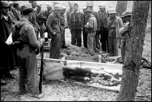 SPAIN. Navacerrada Pass. May-June 1937. Republican soldiers with bloodied stretcher.