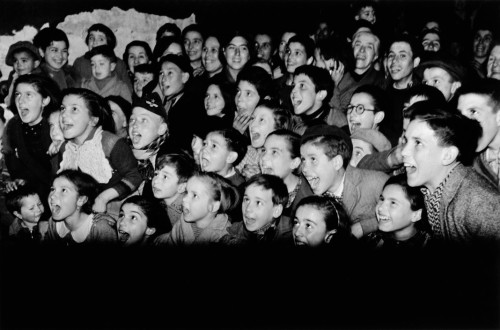 SPAIN. Spanish Civil War (1936-9)
icp 283 Barcelona. January 1939. Entertainment for children who were being evacuated from the city, which was being bombed by fascist planes, as General Franco's fascist troops rapidly approached.