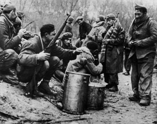 SPAIN. Spanish Civil War (1936-9).
Madrid. November/December, 1936. Republican soldiersThe Spanish Civil War broke out in 1936, when part of the Spanish army rebelled against the Second Republic, a democratic government elected in 1931. It gained international dimensions when Fascist Germany and Italy began supporting the military uprising, led by General Franco, with weapons and soldiers. The USSR helped the Republic, and a significant contingent of volunteers joined the International Brigades and fought for the Republic. The conflict became the symbol of a larger conflict between Fascists and Communists. The war ended in 1939 with Franco's victory over the Republicans.