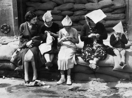 SPAIN. Spanish Civil War (1936/9)
ICP 227. Bilbao. Basque region. May 1937. Italo-German air raids were so frequent that many people spent all day near the shelters. Pays Basque. Bilbao. Mai 1937. La fréquence des bombardements de l'aviation fasciste italo-allemande interdit à la population de rentrer chez elle entre deux alertes.
The Spanish Civil War broke out in 1936, when part of the Spanish army rebelled against the Second Republic, a democratic government elected in 1931. It gained international dimensions when Fascist Germany and Italy began supporting the military uprising, led by General Franco, with weapons and soldiers. The USSR helped the Republic, and a significant contingent of volunteers joined the International Brigades and fought for the Republic. The conflict became the symbol of a larger conflict between Fascists and Communists. The war ended in 1939 with Franco's victory over the Republicans.